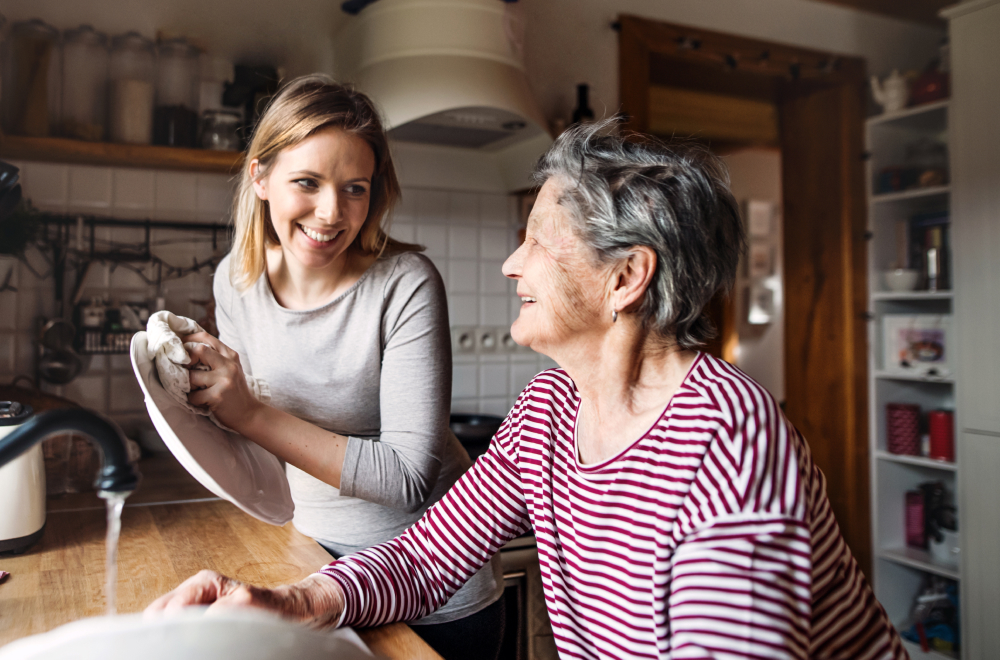 Lady caring for older lady