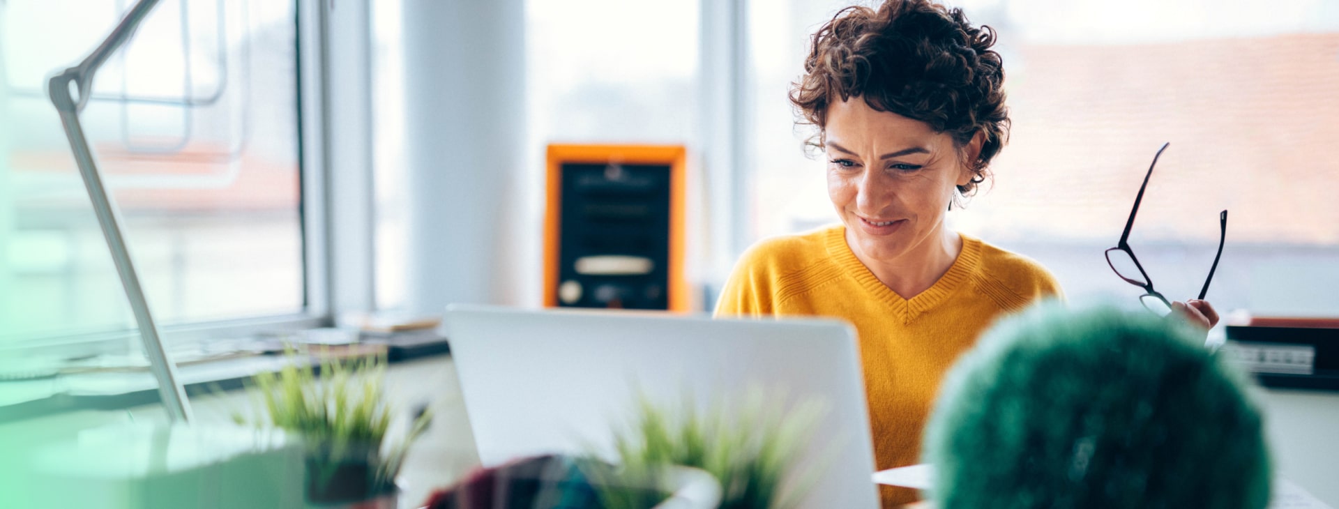 a woman is working on a computer
