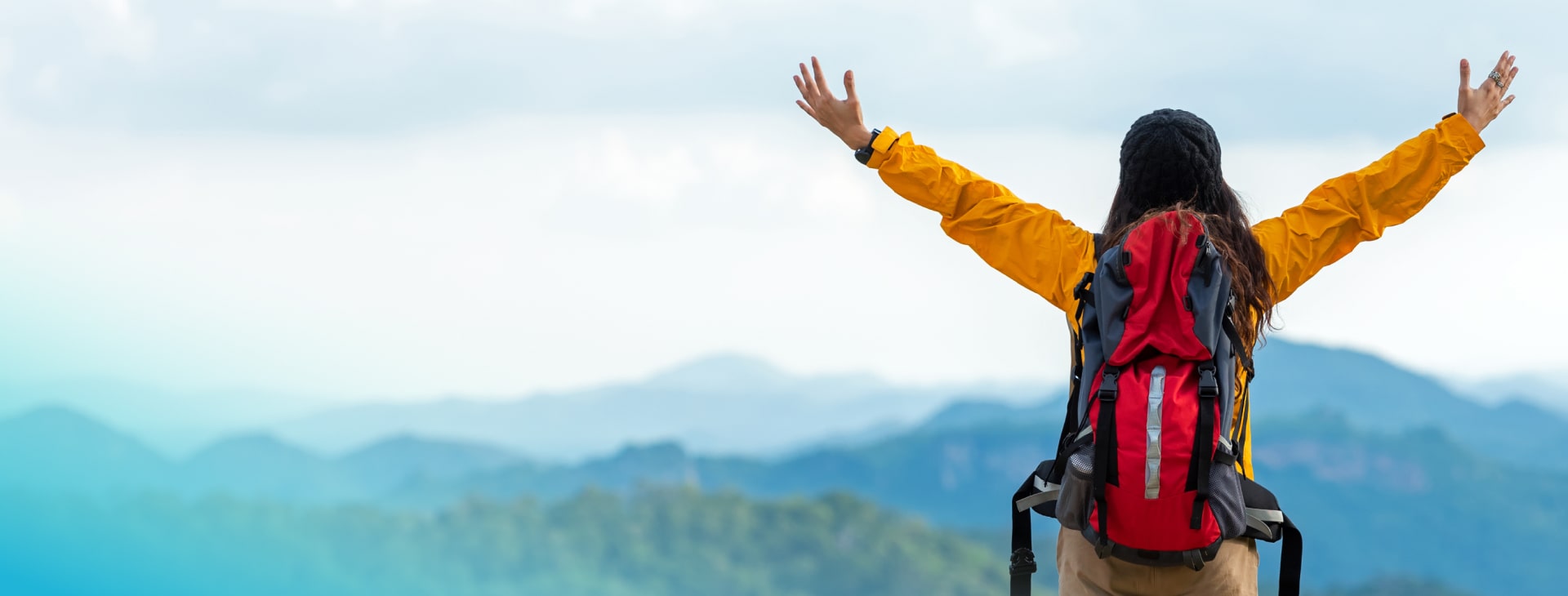 person climbing mountain
