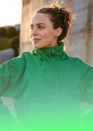 Confident woman looking ahead, representing a positive financial future with CareSuper.