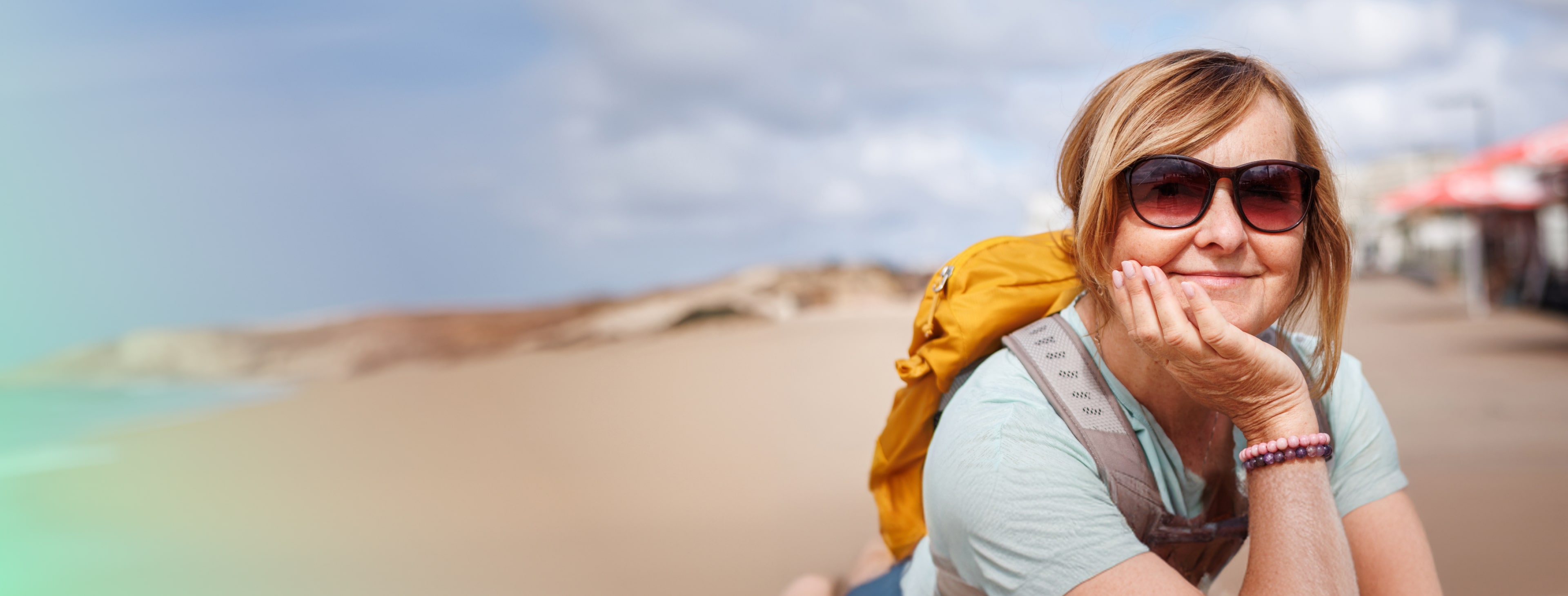 a happy woman travelling