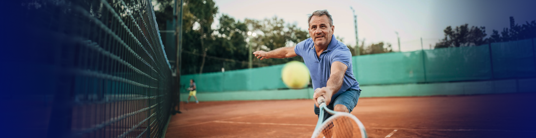 A man is playing tennis