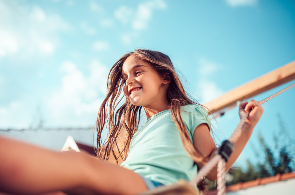 a young girl is playing
